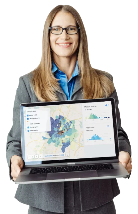 Kristen holding a laptop with a sample map